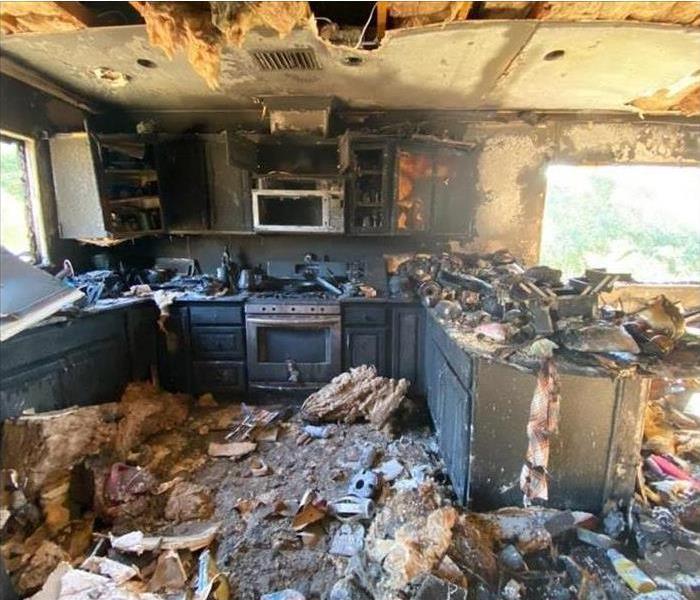 Entire room burnt and damaged.
